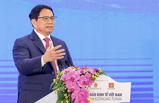 Thủ tướng Phạm Minh Chính tại Diễn đàn Kinh tế Việt Nam chiều 17/12. Ảnh: VGP