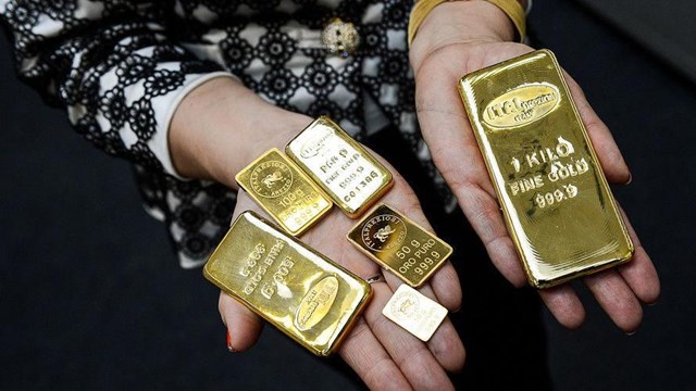 Ngày 27/12: Giá vàng miếng SJC giảm nhẹ, giá vàng thế giới tăng nhẹ nhờ đồng USD suy yếu - Ảnh 1